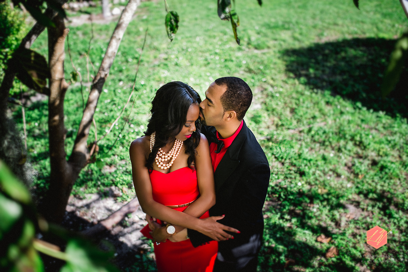 Chic red bahamas holiday session, christmas couples portraits, couples session, bahamas couples session,